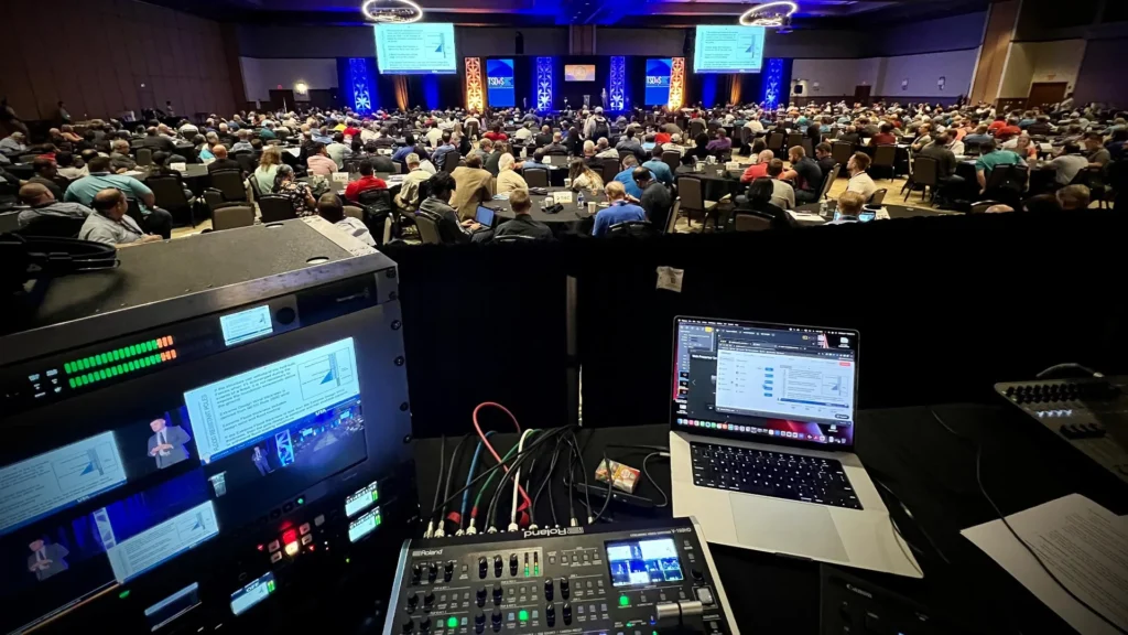 Professional multi-camera live streaming setup for a corporate conference.